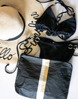 Medium pouch in black with silver and gold stripes