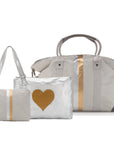 Duffel set with a weekender duffel, jumbo zipper pouch and pouch to purse in earth gray, silver and gold