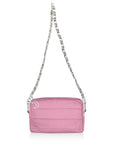 Pink handbag with moon keychain and chain strap on a white background