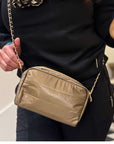 Women wearing Crossbody Purse Shimmer Bronze with Gold and Black Chain link purse strap