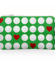 Green pouch with white golf balls and red hearts on a white background