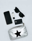 Mini Zipper Pouch Silver Black Star with cell phone, sunglasses, lip balm and credit card.