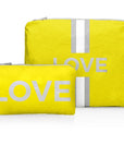 Pouch Sets in lemon yellow with silver stripes and LOVE design