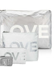 Set of silver and white zipper pouches with 'LOVE' text on a white background