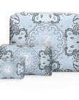 Set of three bags with a blue and white bandana pattern on a white background