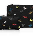 Two black pouches with colorful butterfly pattern on a white background