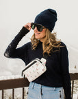 Puffer fanny pack in dancing skiers pattern