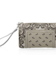 Shimmer beige bandana patterned wristlet on a white background