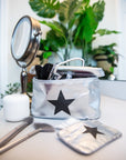 Cosmetic set with cosmetic case and emergency pouch in silver with black star