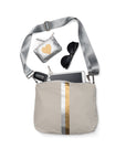 Crossbody purse in earth gray with silver and gold stripes