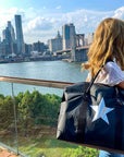 Weekender duffel in black with silver star