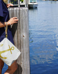 Pouch set in white with gold anchor