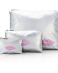 Set of three in limited edition silver with pink lip on white background