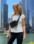 Woman wearing Puffer Crossbody Fanny Pack Belt Bag in Black
