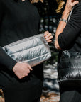crossbody bag and handheld clutch