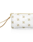 Zip wristlet in shimmer white with busy bee pattern on white background