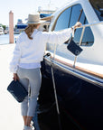 navy handbag and wristlet with white nautical heart and "love"