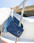 zipper wristlet in navy blue with nautical heart