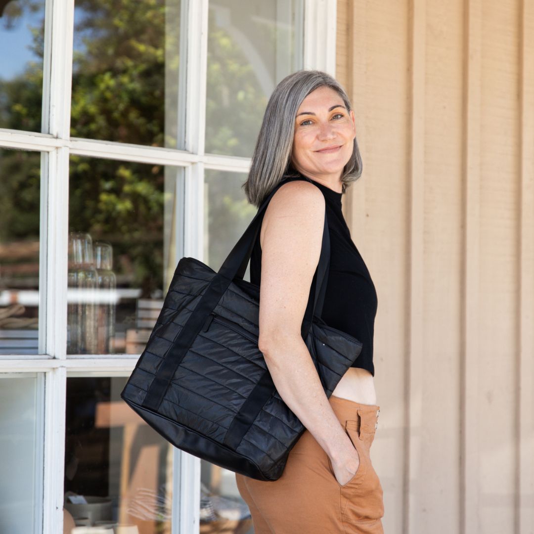 Stephanie with a Shimmer Black Puffer Tote