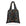 A reusable folding tote bag with a black background and an all-over travel-themed print featuring landmarks from the seven continents along with airplanes, a globe, mountains, a passport and a luggage in small multicolor icons, shown on a clean white background.