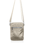 Light beige crossbody bag with a zipper on a white background