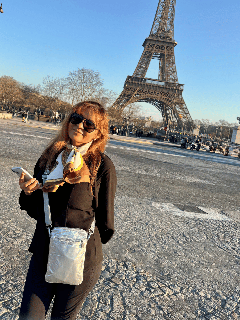 Woman wearing Crossbody Purse Metallic Silver by the Eiffel Tower