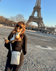 Woman wearing Crossbody Purse Metallic Silver by the Eiffel Tower
