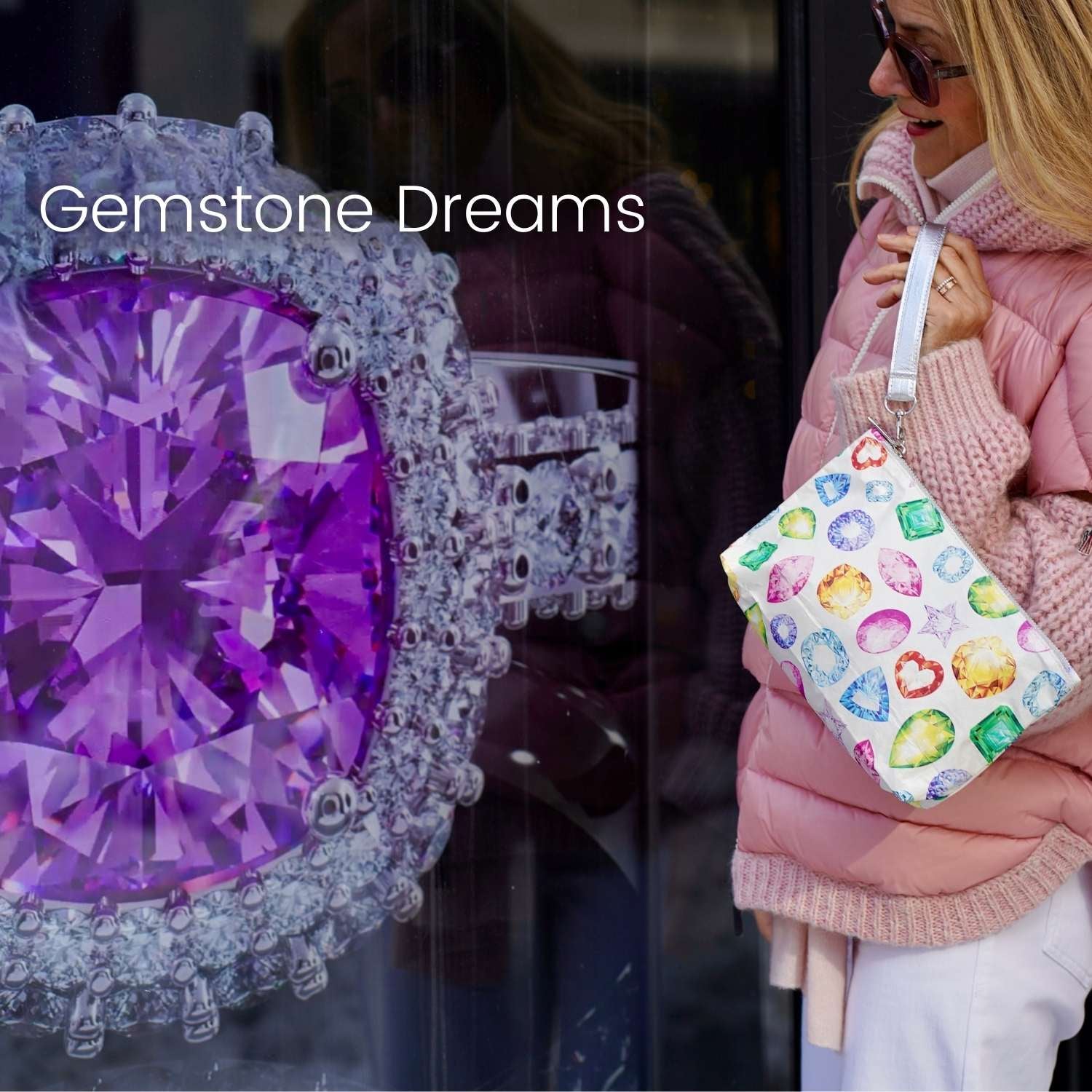 Woman holding a colorful gemstone print bag next to a purple gemstone ring with 'Gemstone Dreams' text.