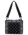Black and white Bandana Print bag with a strap on a white background