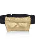 A metallic gold fanny pack attached to a black elastic belt, shown against a plain white background with a soft reflection below.
