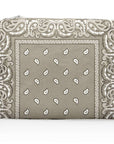 Clutch bag with paisley pattern on a white background