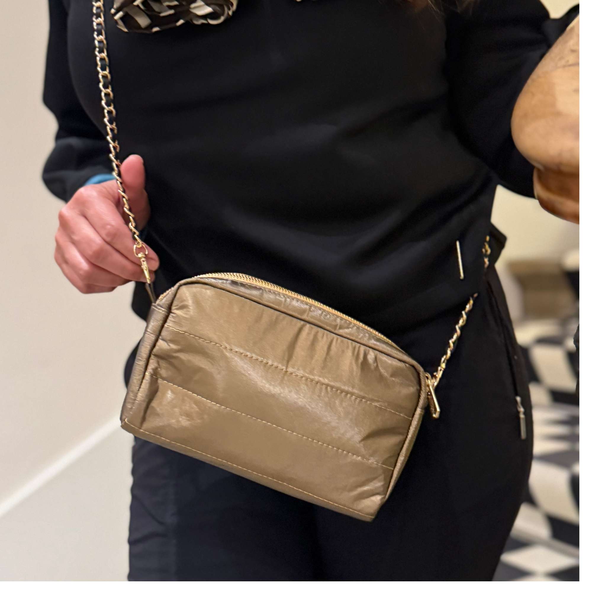 Women wearing Crossbody Purse Shimmer Bronze with Gold and Black Chain link purse strap