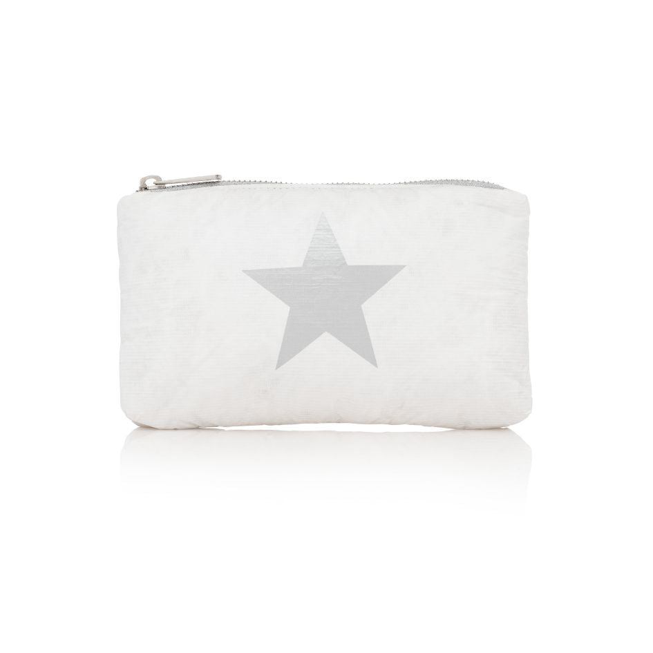 A shimmer white travel pouch with a silver star detail on the front and a zipper closure on white background
