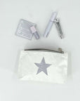 Small zipper pouch in white with silver star with makeup