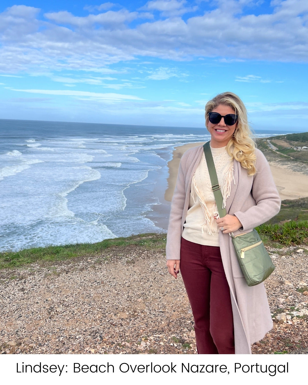 Woman standing at beach overlook in Nazare Portugal carrying green crossbody purse