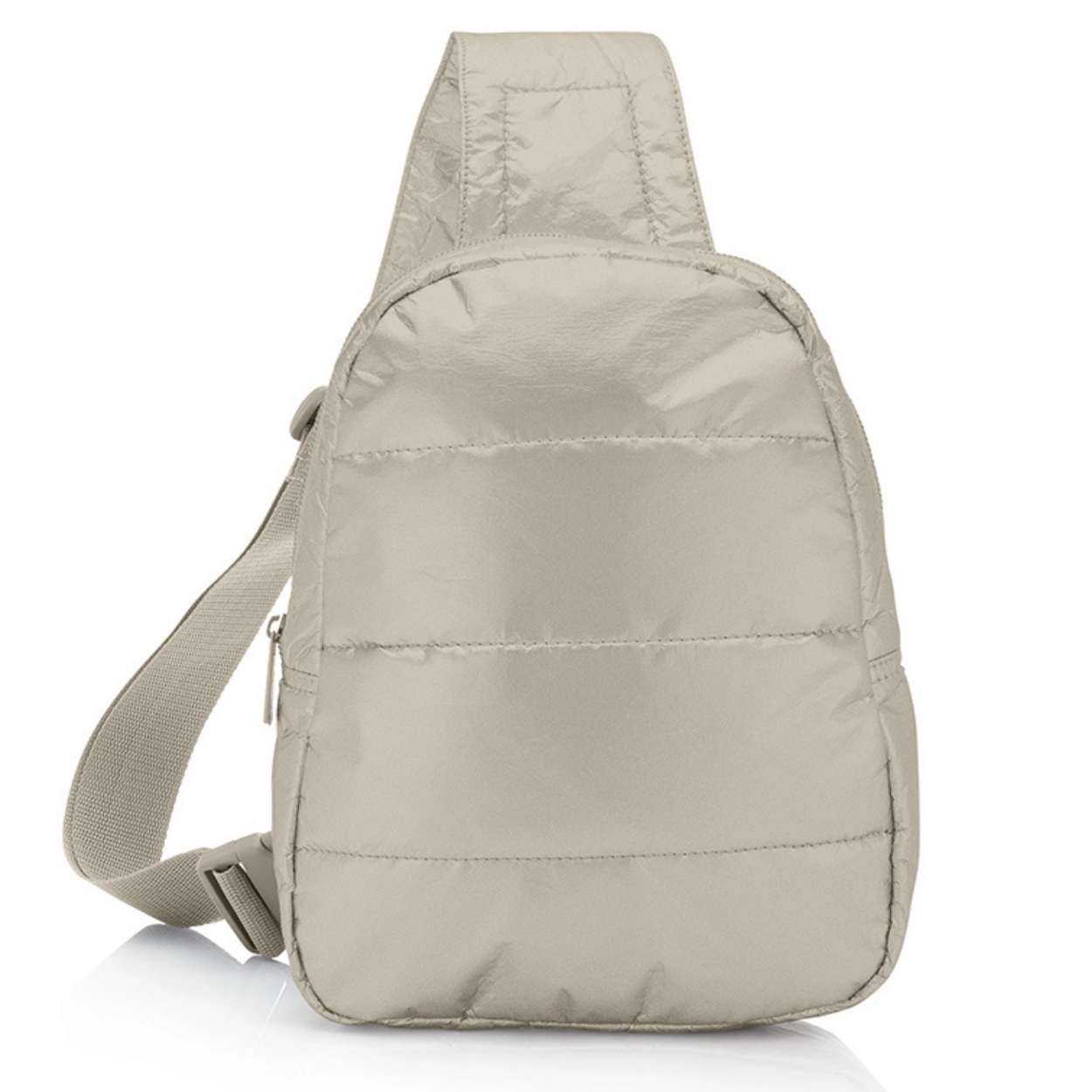 Puffer crossbody backpack in shimmer beige on white background