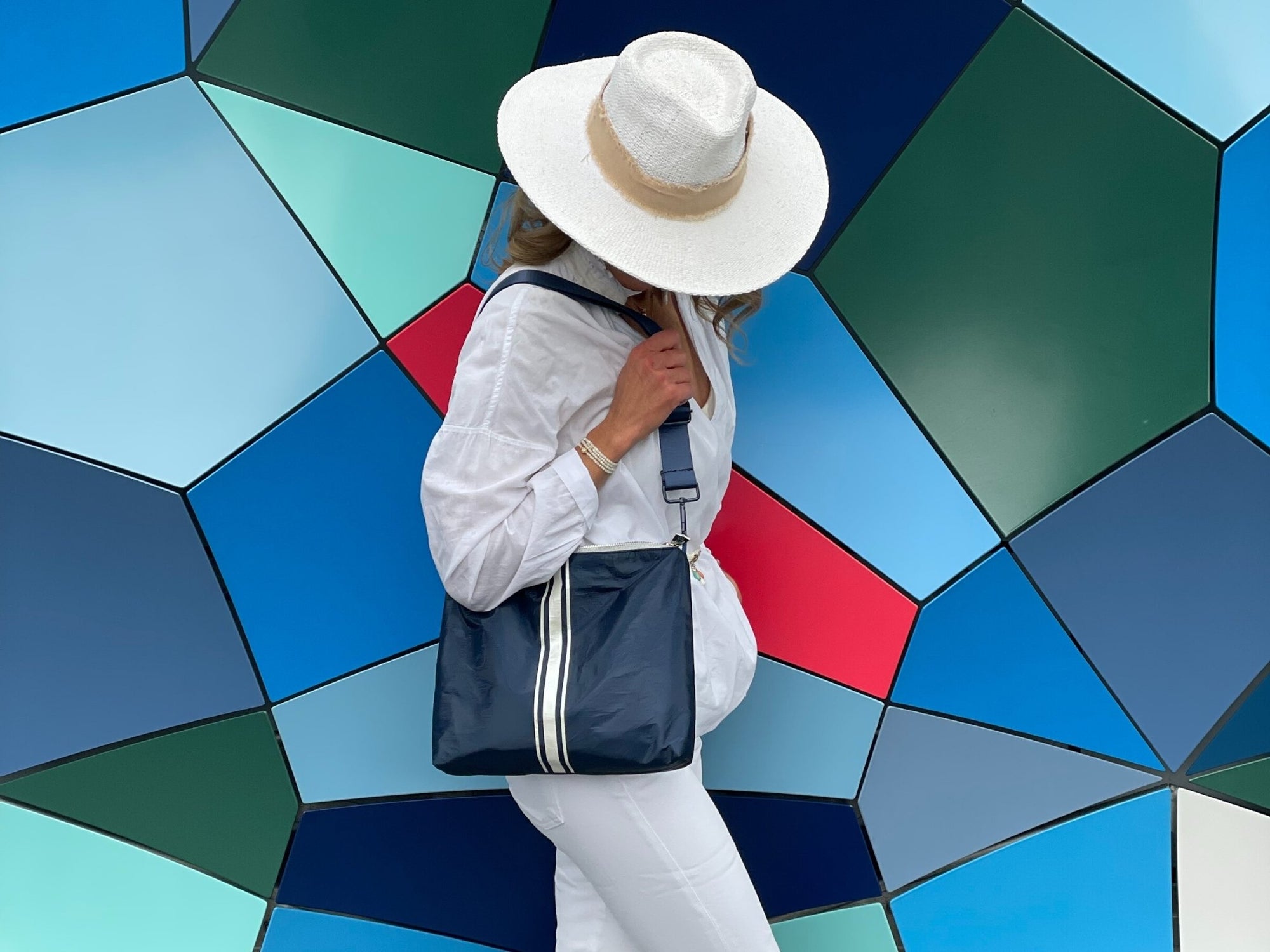 Crossbody purse in shimmer navy with white stripes