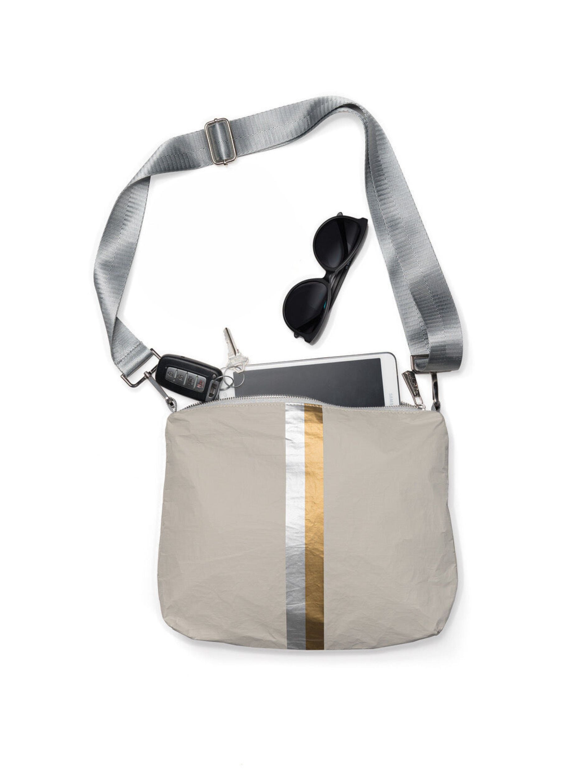 Crossbody purse in earth gray with silver and gold stripes
