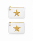 Two white zippered pouches with large gold star designs on the front, shown on a clean white background.