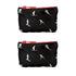 Two black zippered pouches with a white ski and snowboard silhouette pattern, featuring red zipper pulls, shown against a plain white background.