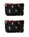Two black zippered pouches with a white ski and snowboard silhouette pattern, featuring red zipper pulls, shown against a plain white background.