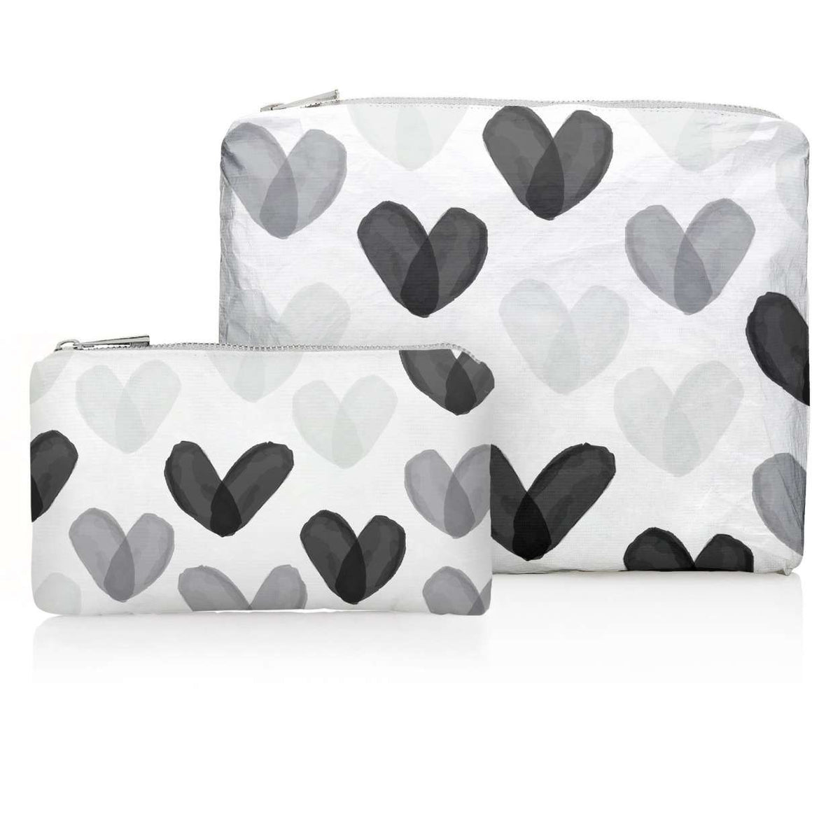 Set of Two Zip Pouches in Language of Love Black and White Heart Print on white background.