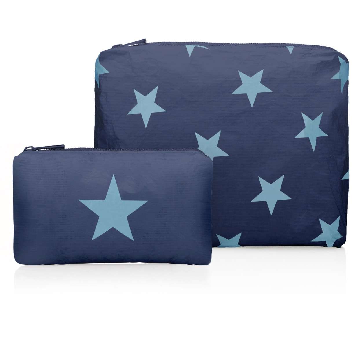 Set of two zipper pouches in shimmer navy blue with light blue stars