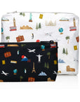 Two travel-themed pouches, one black with world landmarks and one white with travel icons, on a white background.