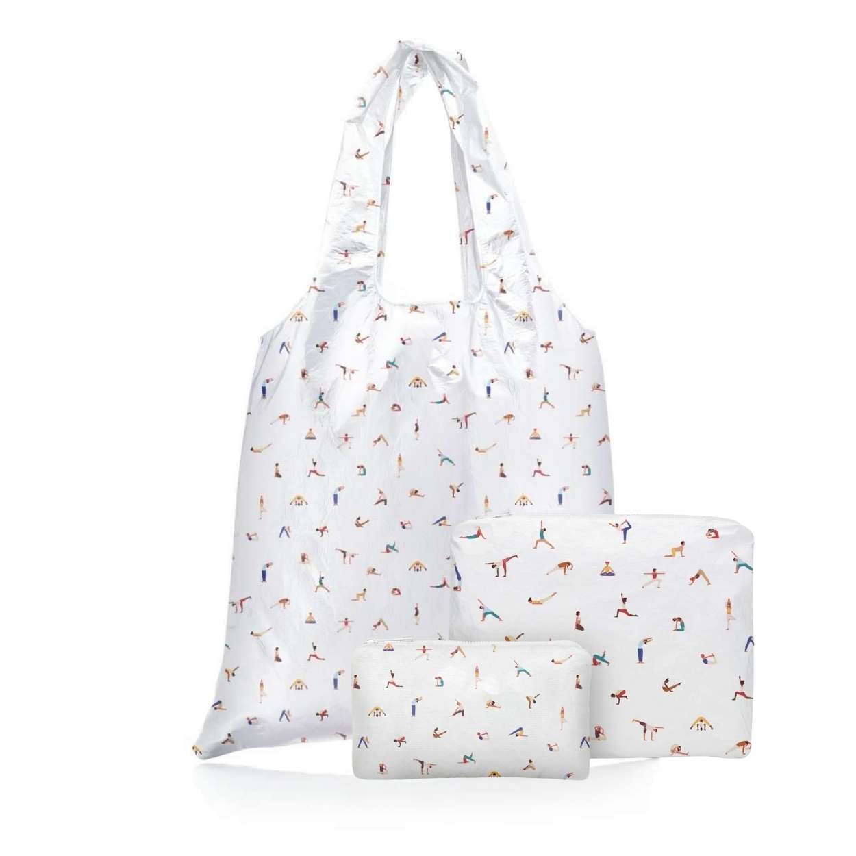 White reusable tote bag and zipper pouches with colorful yoga pose print on a white background