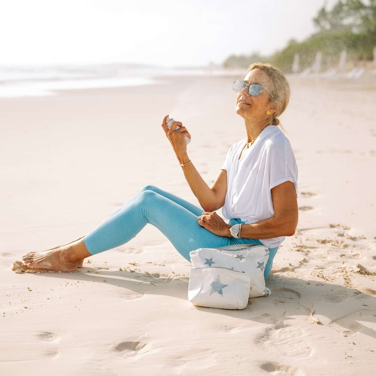 Set of Two Zipper Pouches in White with Silver stars Water Resistant on the Beach
