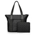 Black signature travel tote with a matching  medium zip pouch in back, both featuring the signature striped and printed pattern.