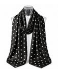 Signature Silk Scarf in black featuring the exclusive Signature Hi Print with hearts, moons, stars, and H! icons on white background