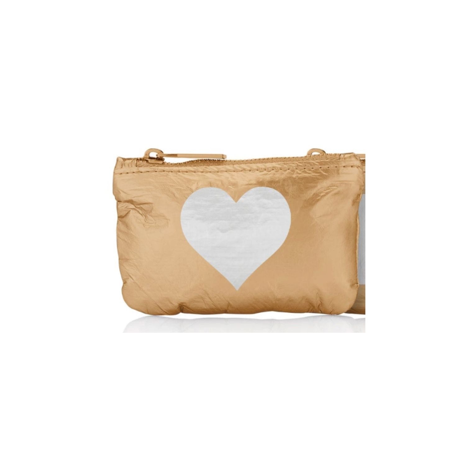 A metallic gold zippered pouch with a large white heart printed on the front, set against a plain white background.