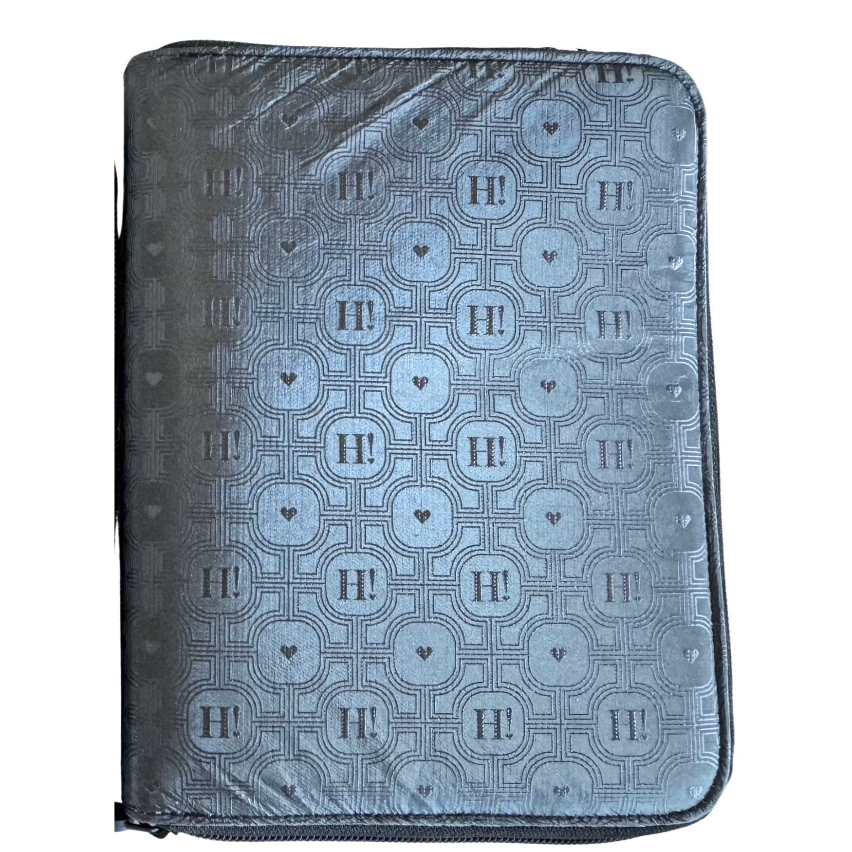 Black travel jewelry organizer with an embossed Signature Hi Print and zip-around closure.